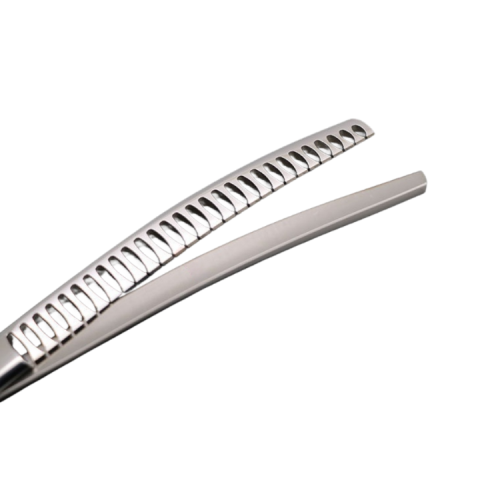 Close-up view of chunker teeth on curved dog grooming shears