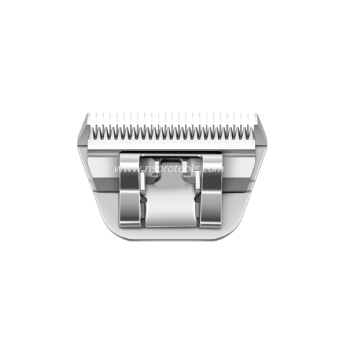 Close-up of NStools wide clipper blade showing polished stainless steel cutting edge