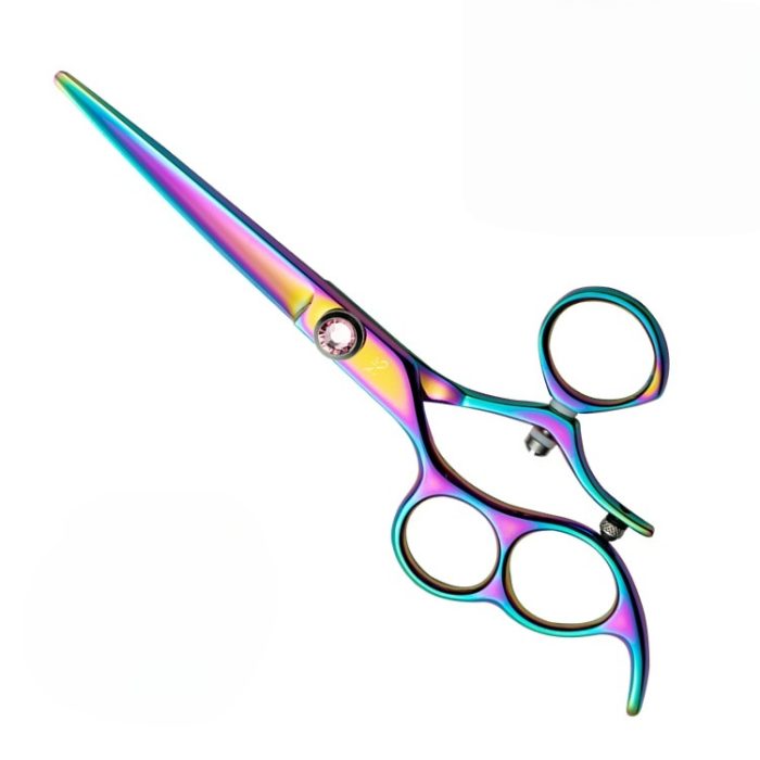 Left handed swivel hair shears cutting through thick hair