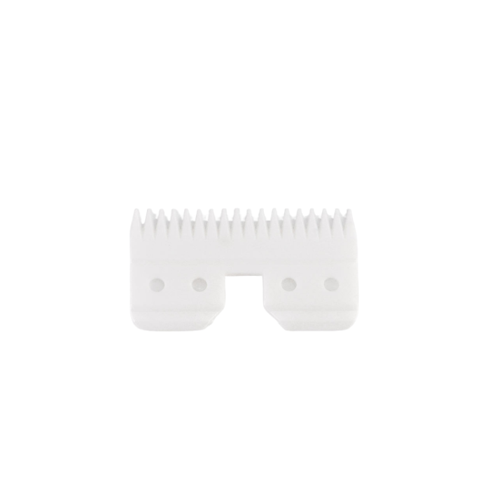 replacement dog clipper blade being cleaned under water